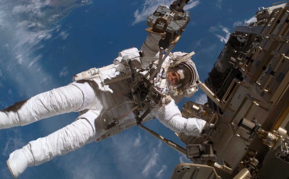 Astronauts Working in Space