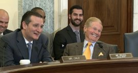 Senators Ted Cruz and Bill Nelson laugh during a subcommittee meeting